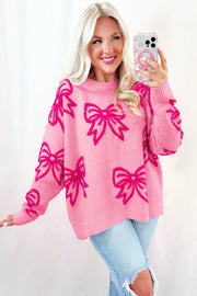 Drop shoulder pink knit pullover with all-over bow motif