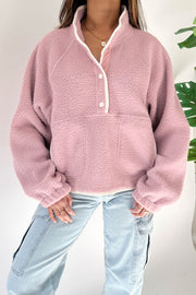 Cozy fleece pullover sweatshirt with elastic cuffs and long sleeves
