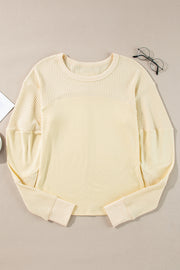 Long sleeve thermal top with exposed seam detail and cotton blend stretch fabric