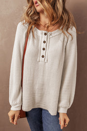 Oatmeal waffle knit long sleeve blouse with round neck and relaxed shift fit