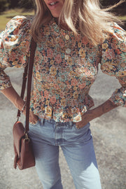 Yellow floral smocked crop top with long bubble sleeves