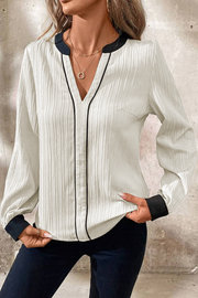 Long sleeve V-neck blouse with subtle colorblock detail