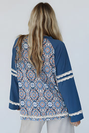 Blue Geometric Long Sleeve Top showing ric rac and lace trim detailing