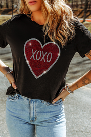 Black Graphic Crewneck Tee with crew neckline and short sleeves