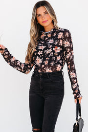 Sheer floral mesh long sleeve top with body-skimming silhouette