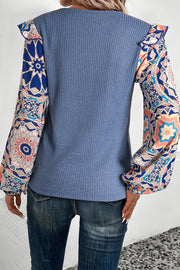 Elegant floral sleeve blouse with geometric patchwork design