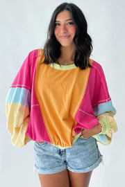 Plus size sweatshirt back view with colorblock patchwork panels