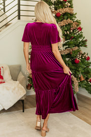 Velvet maxi dress showing flowing tiered boho-inspired skirt