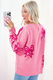 Bow pattern loose sweater with round neckline and long sleeves