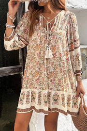 Apricot floral tassel drawstring mini dress with V-neckline