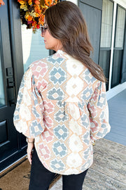 Khaki blouse showing balloon bracelet-length sleeves