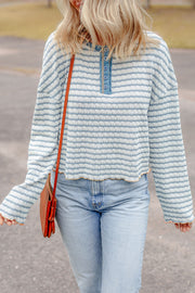 Sky blue striped Henley top with front buttons and long sleeves, casual style
