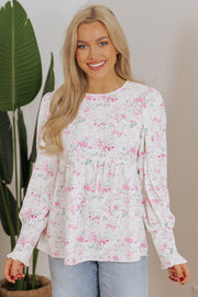 Pink floral babydoll blouse with gathered balloon long sleeves