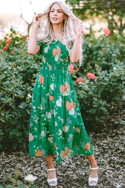 Green floral smocked midi dress in lightweight viscose fabric