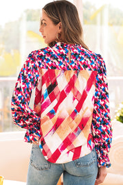 Loose shift blouse featuring dramatic puff long sleeves and stand neck