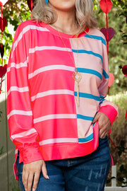 Plus size crewneck top in bold rose stripe pattern