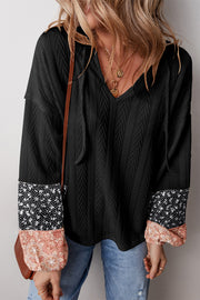 Beige floral patchwork top in stretchy polyester knit fabric