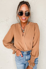 Long sleeve solid color blouse with flattering notch V-neckline