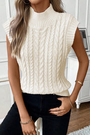 Oatmeal knit vest layered over a button-down shirt