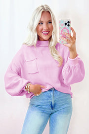 Relaxed pink knit sweater dress in longer length