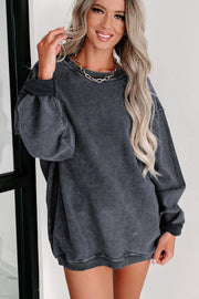 Ribbed knit pullover with long sleeves and tunic length