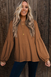 Textured waffle knit long sleeve top with medium stretch fabric