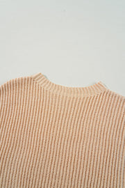 Long sleeve cable knit sweater with round crew neckline