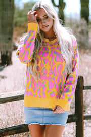 Vitality Orange baggy sweater showing ribbed trim texture detailing
