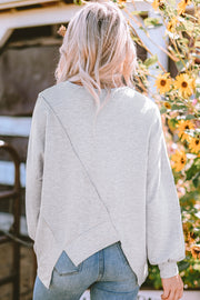 Colorblock tunic top with crew neckline and relaxed shift silhouette