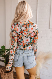 Long sleeve floral mesh crop top with round neckline
