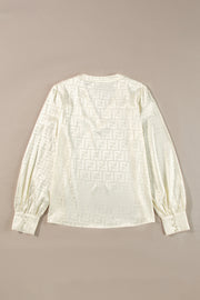 Textured geometric jacquard weave on polished sheath blouse
