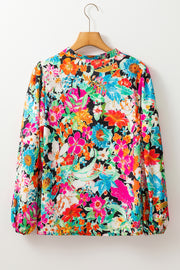 Feminine floral V-neck blouse with delicate ruffle finish