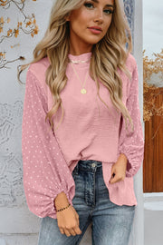 Long sleeve Swiss dot blouse with flowing loose-fit silhouette