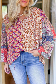 Orange floral long sleeve blouse with self-tie V-neck detail