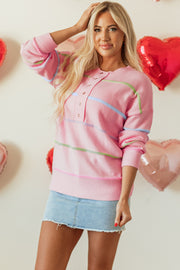 Colorblock rainbow stripe sweater with functional button-up neckline
