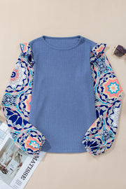 Waffle knit long sleeve top with ruffle detail and medium stretch