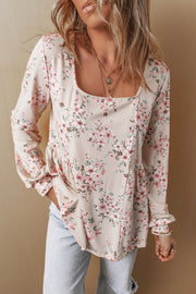 Pink floral pleated U-neck blouse with loose-fit shift silhouette