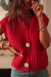 Shift silhouette knit vest layered over a white button-up shirt
