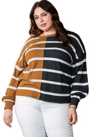 Plus size colorblock striped patchwork loose top in mustard and black, modeled on a woman