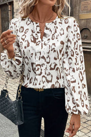 Split neck leopard print top styled for daily elegant wear