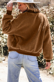 Sherpa bomber jacket showing soft cozy fleece texture