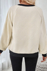 Color Block Raglan Sleeve Top showing textured fabric detail