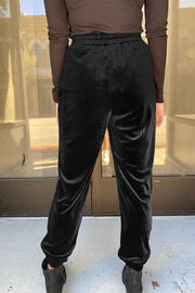 High-waist black velvet joggers in soft stretch fabric