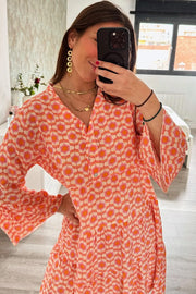 Floral mini dress with notched neckline and high-waist flared silhouette