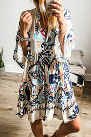 White printed tribal mini dress in relaxed shift silhouette