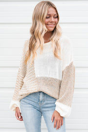 Oatmeal knit pullover with keyhole tie accent and loose drop shoulder silhouette