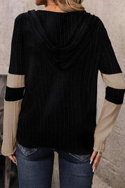 Textured colorblock hooded top with half zip and relaxed shift fit