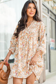 Long sleeve boho floral dress with flared ruffle silhouette