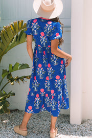 Floral maxi dress with short puff sleeves and ruched accents