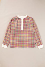 Pink colorblock Henley blouse styled for casual daily wear
